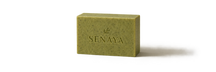 Minimal editorial footer product strip, 3:1. Place the exact sourced SENAYA matcha soap alone, fully